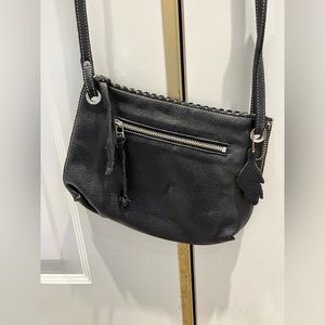 Roots cross body bag
